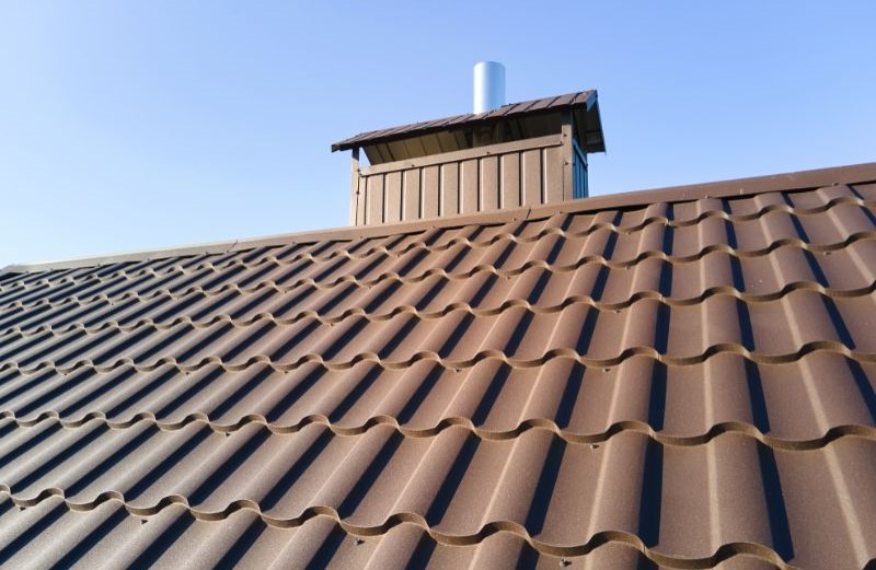 A residential roof with metal shingle
