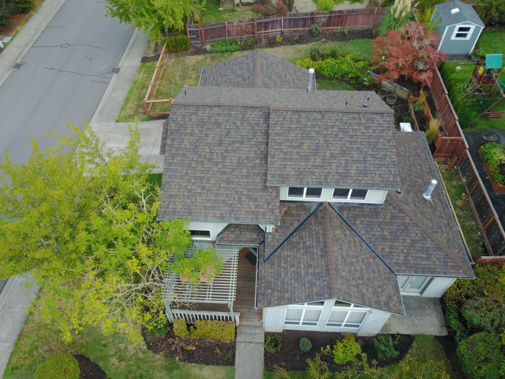 A residential building with asphalt shingle roof